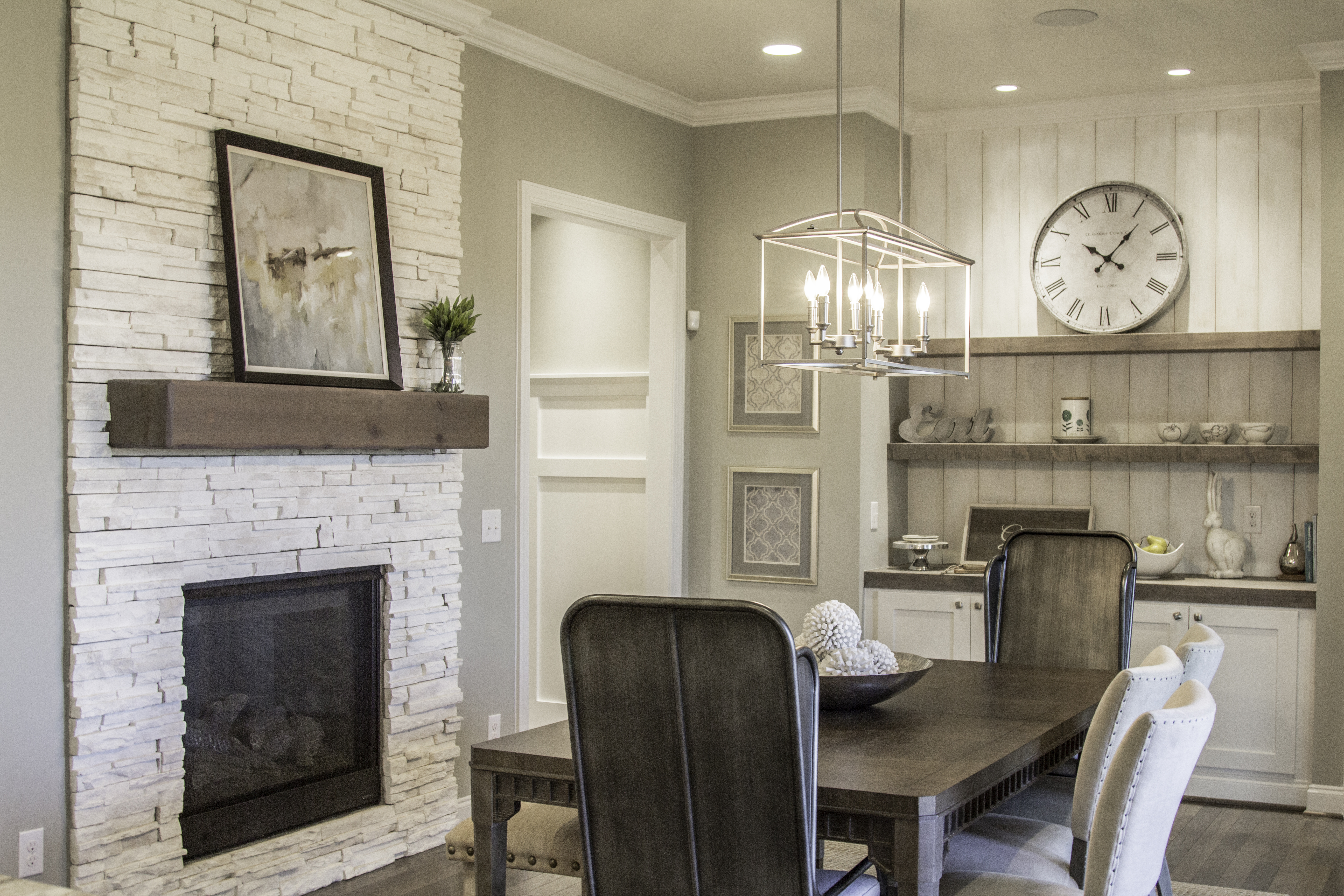 White Stone Fireplace in the Keeping Room in the Crawford plan at Banks Pointe.