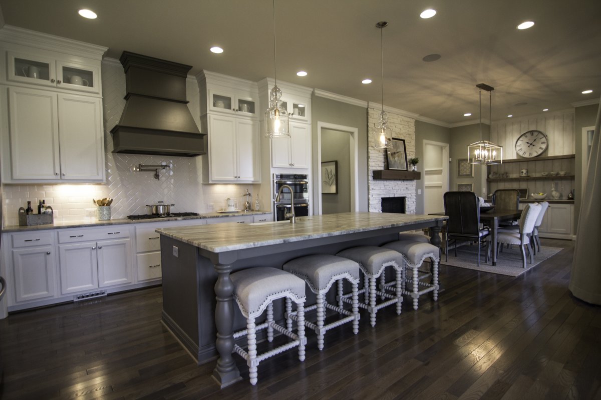 Gray and white cabinets, large island with seating for 5 make this a great place to enjoy breakfast.